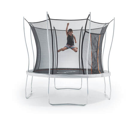 Young boy jumping on large Vuly Play trampoline
